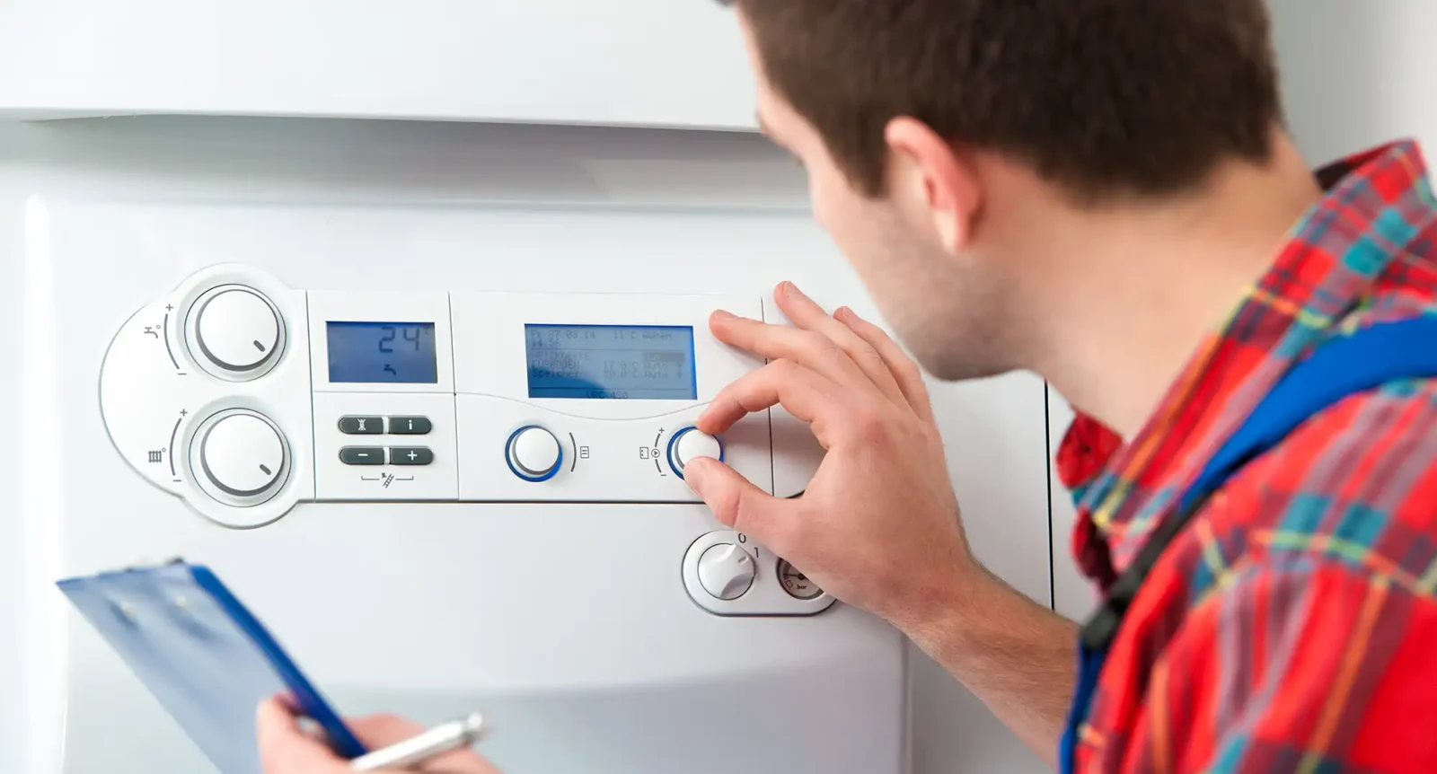 Technician servicing the gas boiler